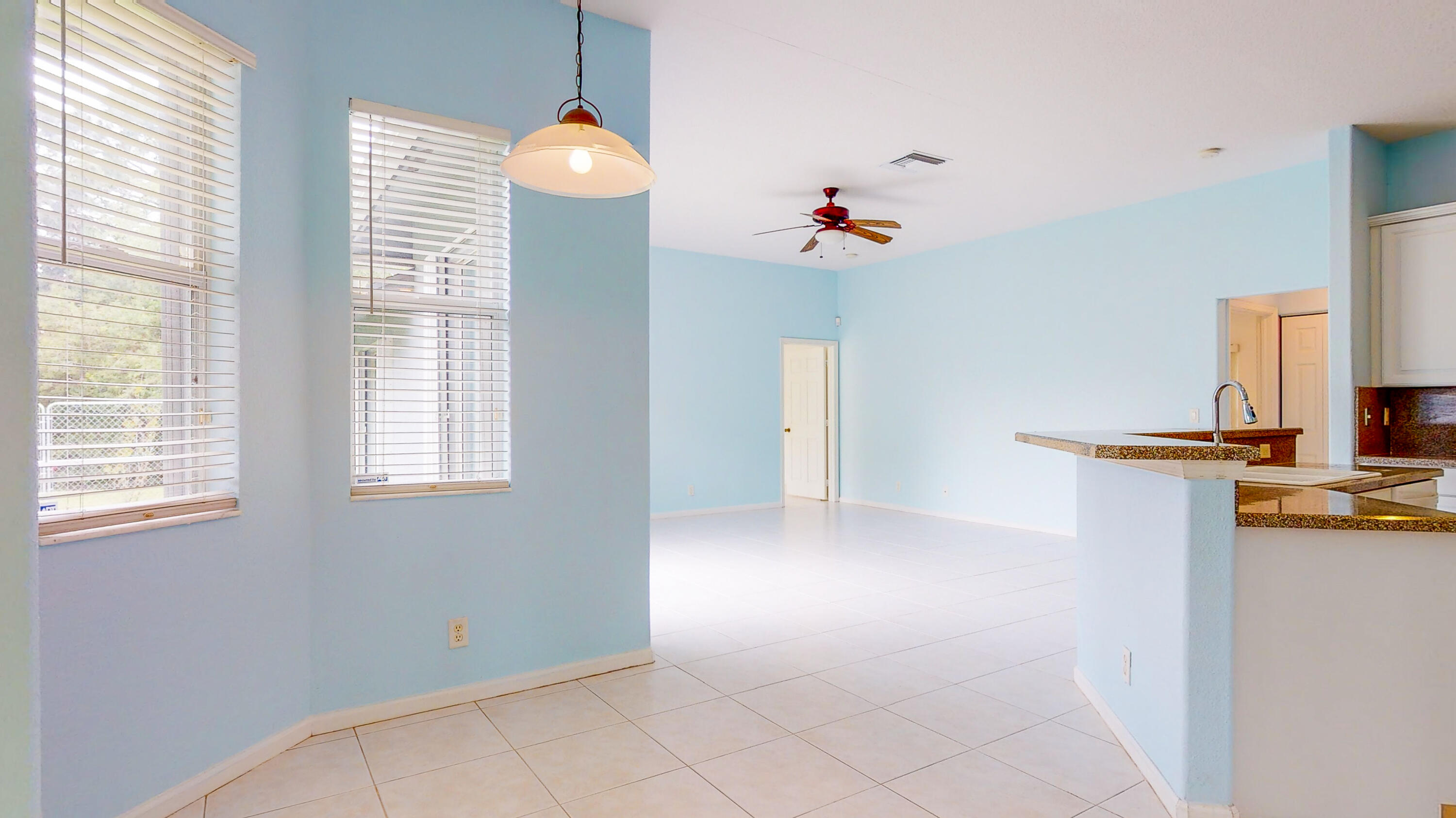 2072 Southeast Hanford Road Port St. Lucie, FL 34952 - Photo 9 of 48 a view of kitchen and window