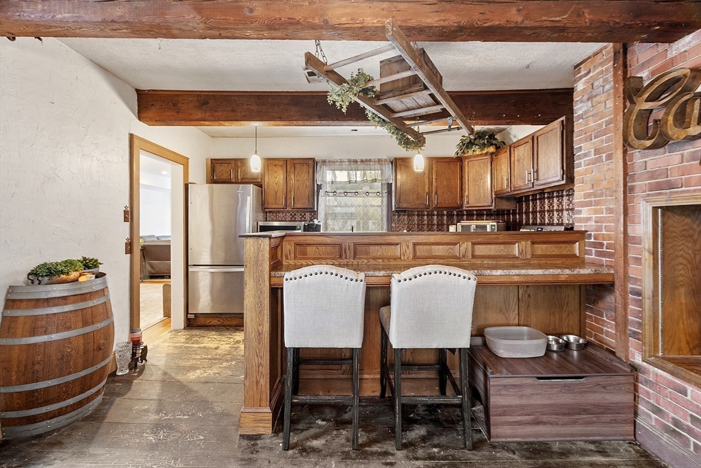 199 High Street Athol, MA 01331 - Photo 13 of 37 a dining room with furniture and a kitchen