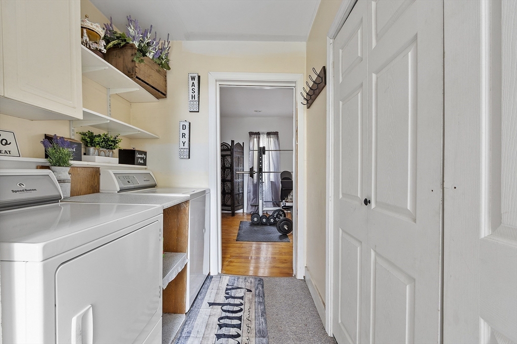 199 High Street Athol, MA 01331 - Photo 27 of 37 a kitchen with a refrigerator and white cabinets