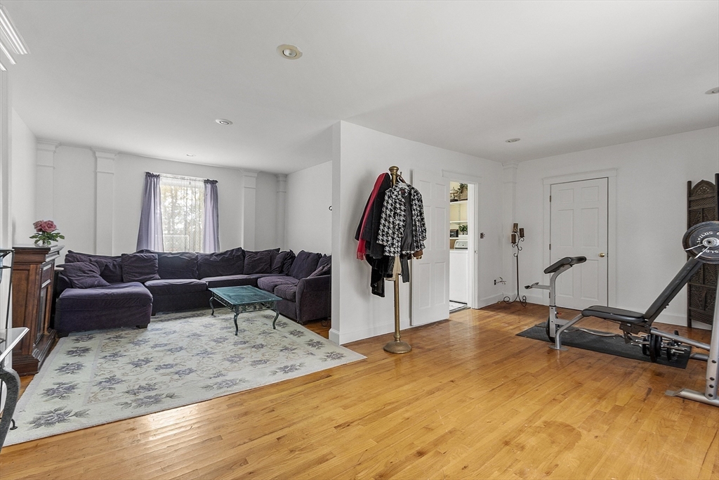 199 High Street Athol, MA 01331 - Photo 28 of 37 a living room with furniture a window and gym equipment