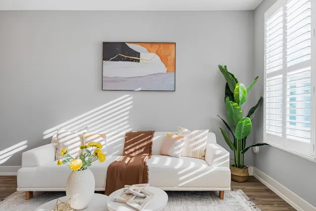 a bedroom with a bed and a couch