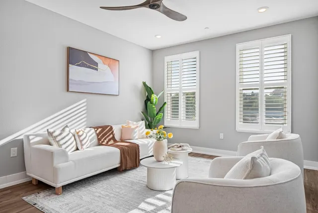 a living room with furniture and window