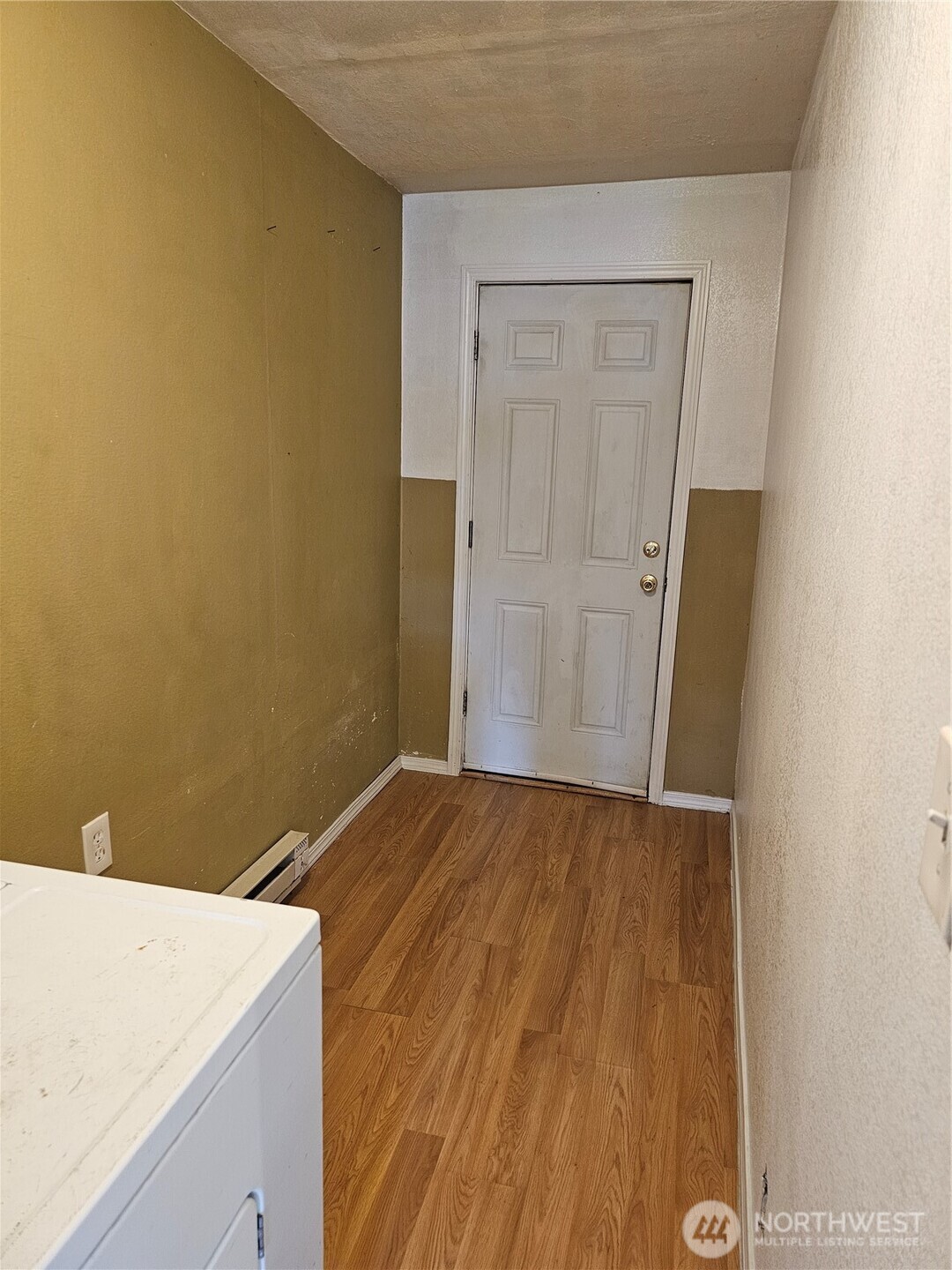 417 Monroe Street Hoquiam, WA 98550 - Photo 20 of 27 a view of storage and utility room with wooden floor