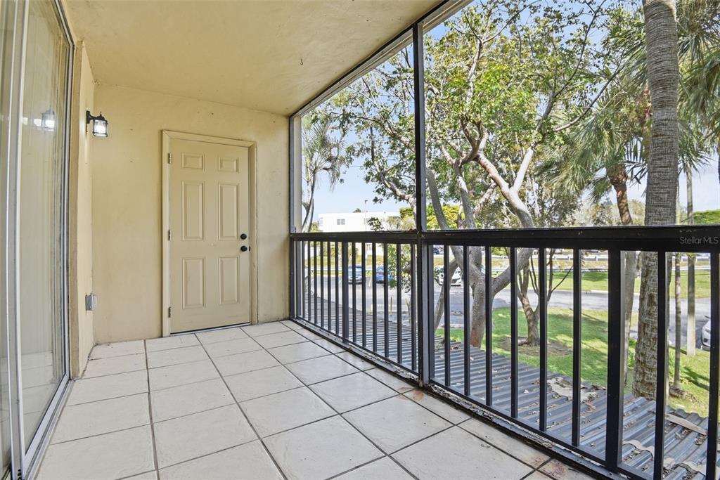 10875 Southwest 112th Avenue, Unit 202 Miami, FL 33176 - Photo 24 of 26 a view of a porch