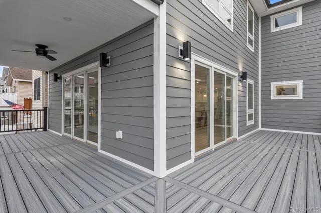 a view of a balcony with wooden floor
