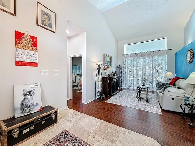 a large kitchen with stainless steel appliances kitchen island granite countertop a large counter top and stainless steel appliances