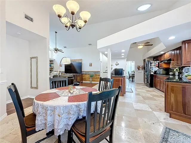 a bedroom with a bed dresser and a window