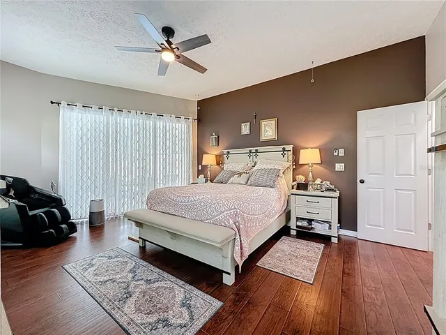 a view of a backyard with a swimming pool