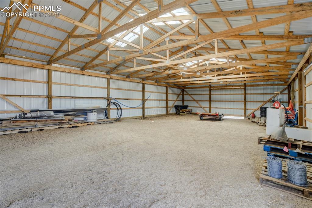 22038 County Road 2 Rush, CO 80833 - Photo 37 of 50 Garage with metal wall