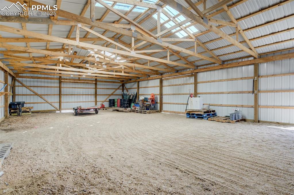 22038 County Road 2 Rush, CO 80833 - Photo 38 of 50 Garage featuring metal wall
