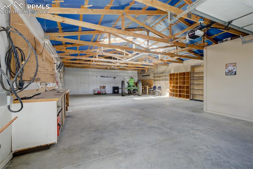 22038 County Road 2 Rush, CO 80833 - Photo 41 of 50 Garage with a garage door opener