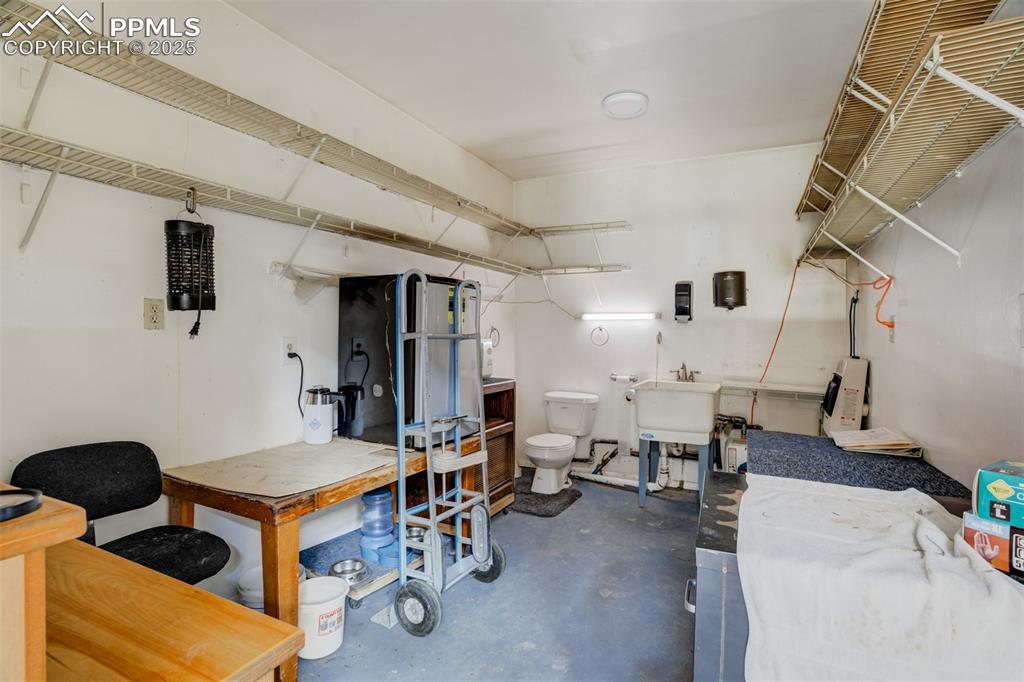 22038 County Road 2 Rush, CO 80833 - Photo 43 of 50 Basement featuring a sink
