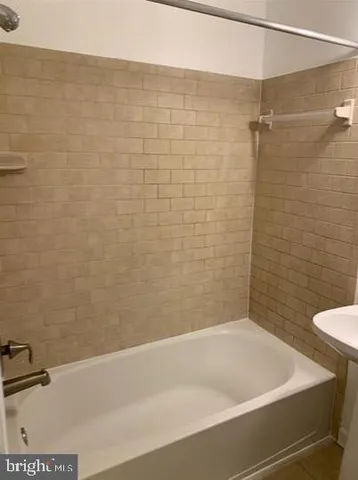 a bathroom with a bathtub