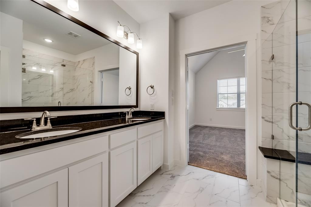 1366 Madison Avenue Flower Mound, TX 75028 - Photo 14 of 19 a bathroom with double sink and a mirror