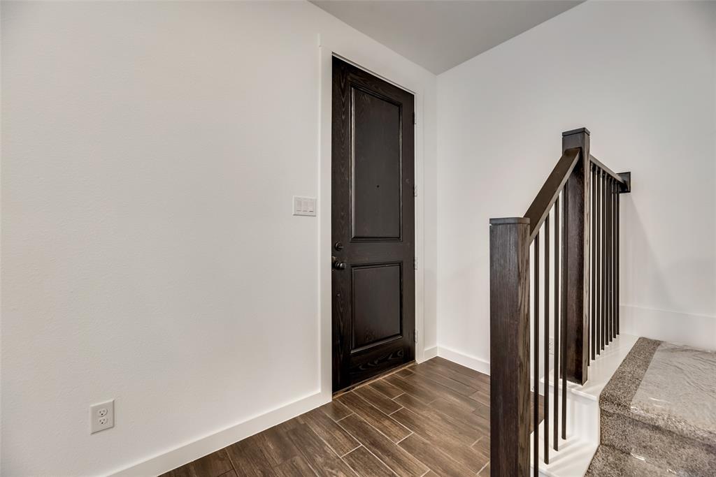 1366 Madison Avenue Flower Mound, TX 75028 - Photo 3 of 19 a view of a hallway with wooden floor and closet