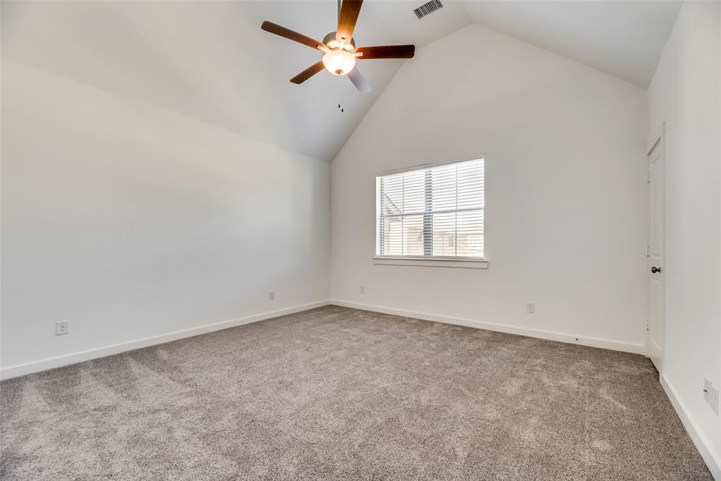 1366 Madison Avenue Flower Mound, TX 75028 - Photo 10 of 19 an empty room with windows and fan