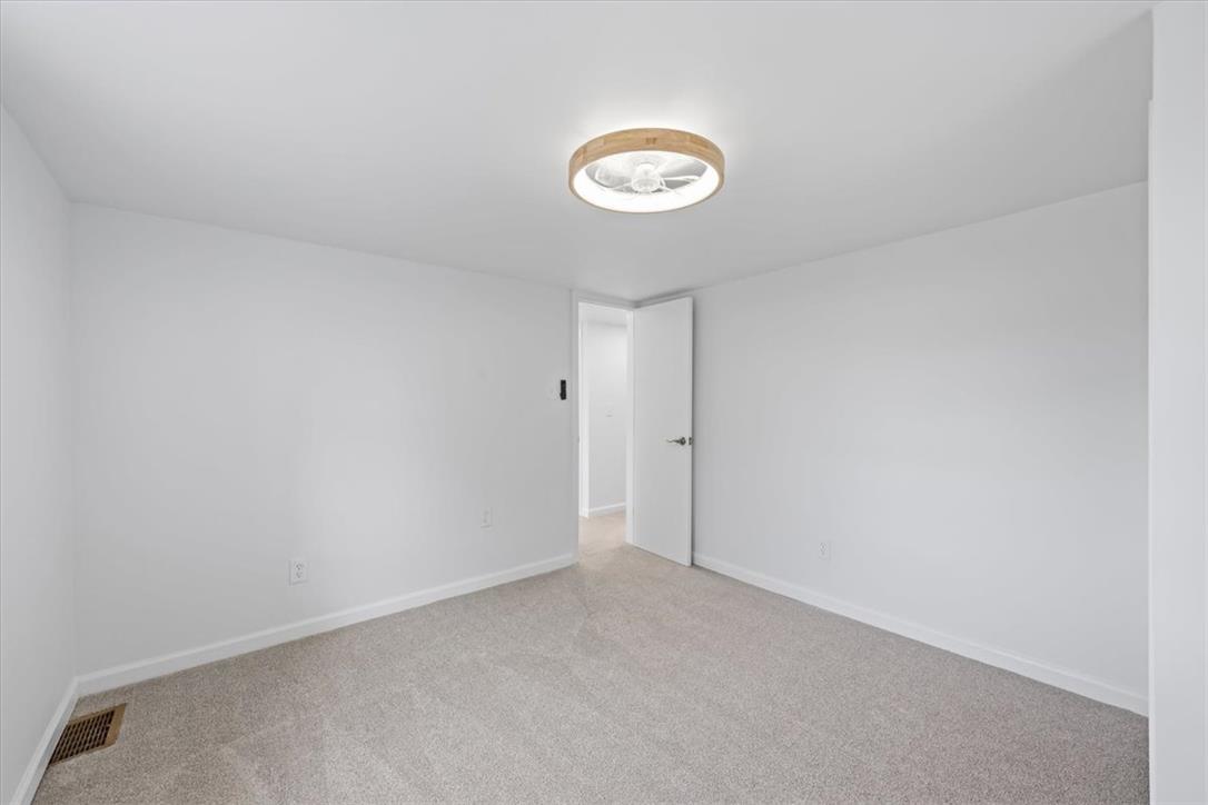 2412 Clearview Road Coplay, PA 18037 - Photo 21 of 53 Smooth plaster walls and soft carpeting define this clean, versatile bedroom space.