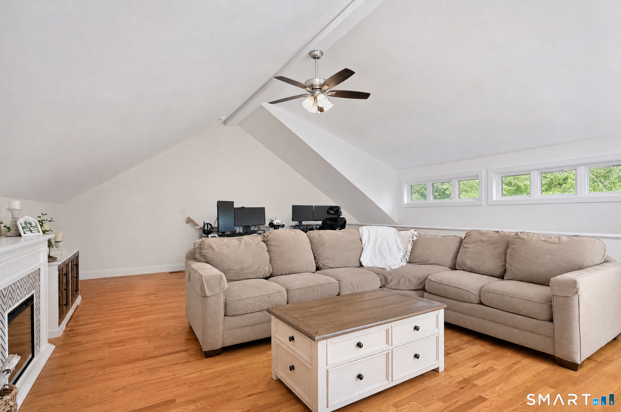 43 George Street, Unit 1 Seymour, CT 06483 - Photo 23 of 33 Another view of the living room with windows in vaulted ceiling to let in the natural light.