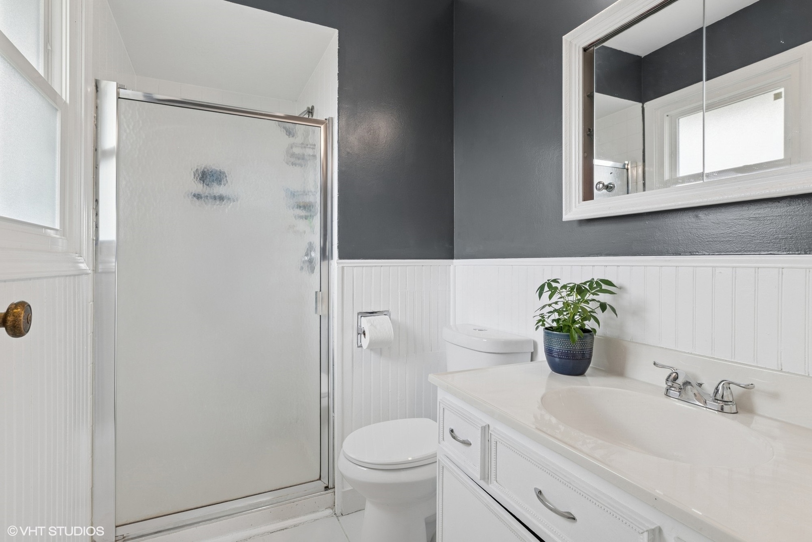 1285 Fairmont Road Hoffman Estates, IL 60169 - Photo 12 of 21 a bathroom with a sink toilet and shower