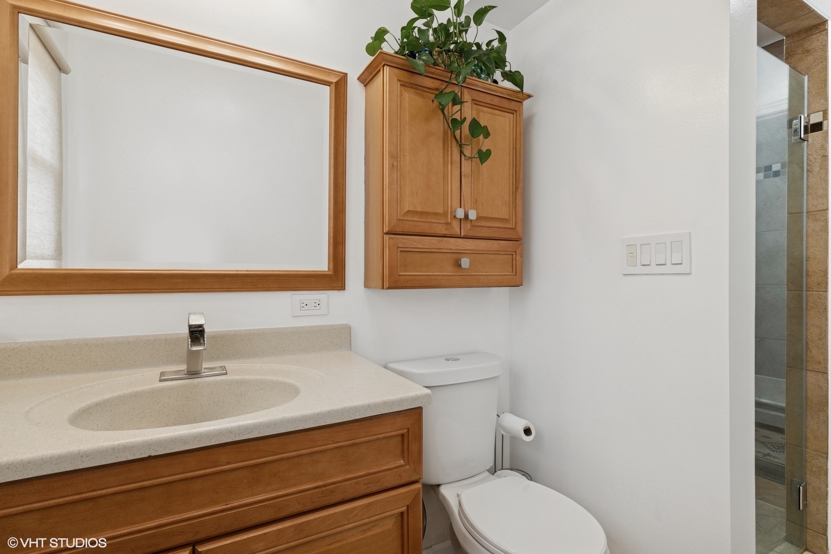 1285 Fairmont Road Hoffman Estates, IL 60169 - Photo 14 of 21 a bathroom with a sink toilet and shower