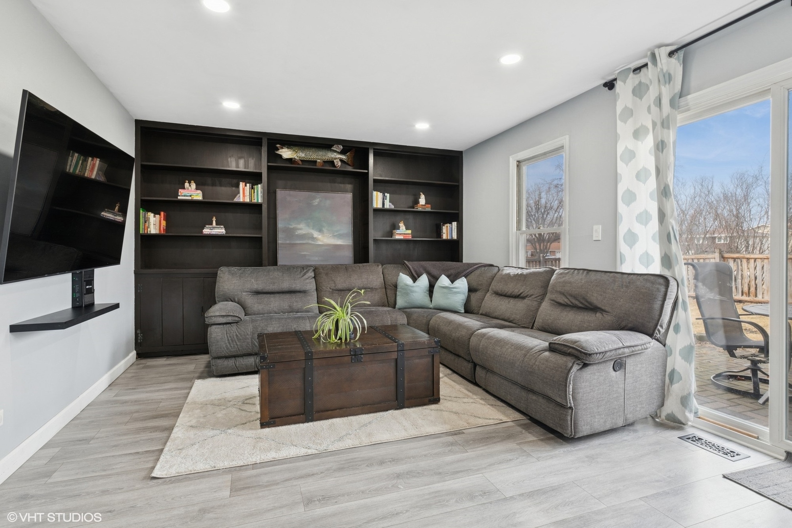1285 Fairmont Road Hoffman Estates, IL 60169 - Photo 15 of 21 a living room with furniture and a flat screen tv