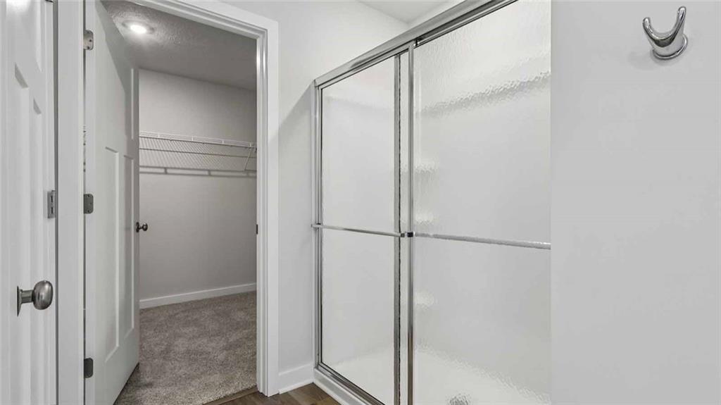1099 Peachtree Road Carnegie, PA 15106 - Photo 8 of 25 a bathroom with a glass shower door