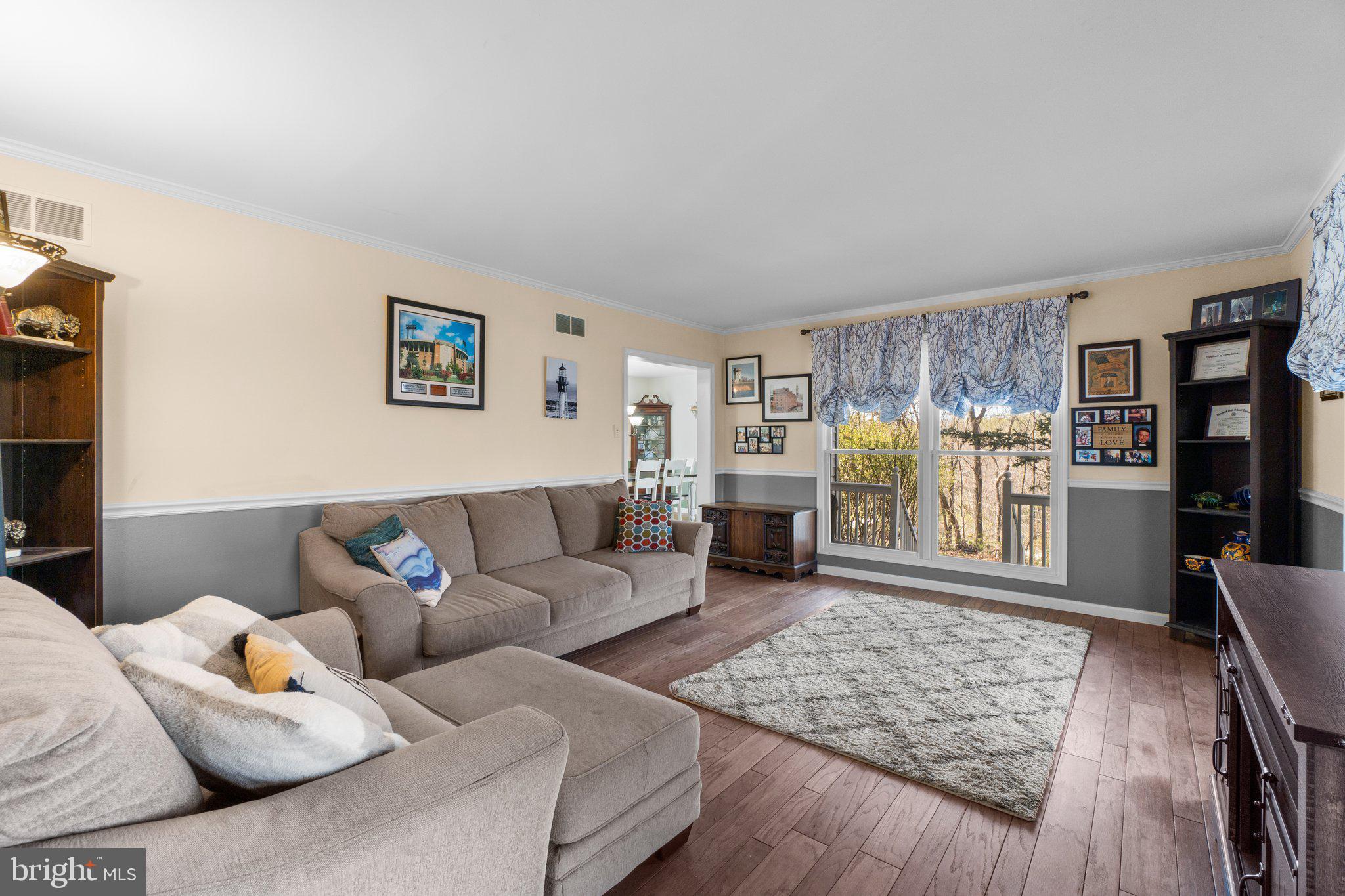 4701 Gross Mill Road Hampstead, MD 21074 - Photo 2 of 62 a living room with furniture and a wooden floor