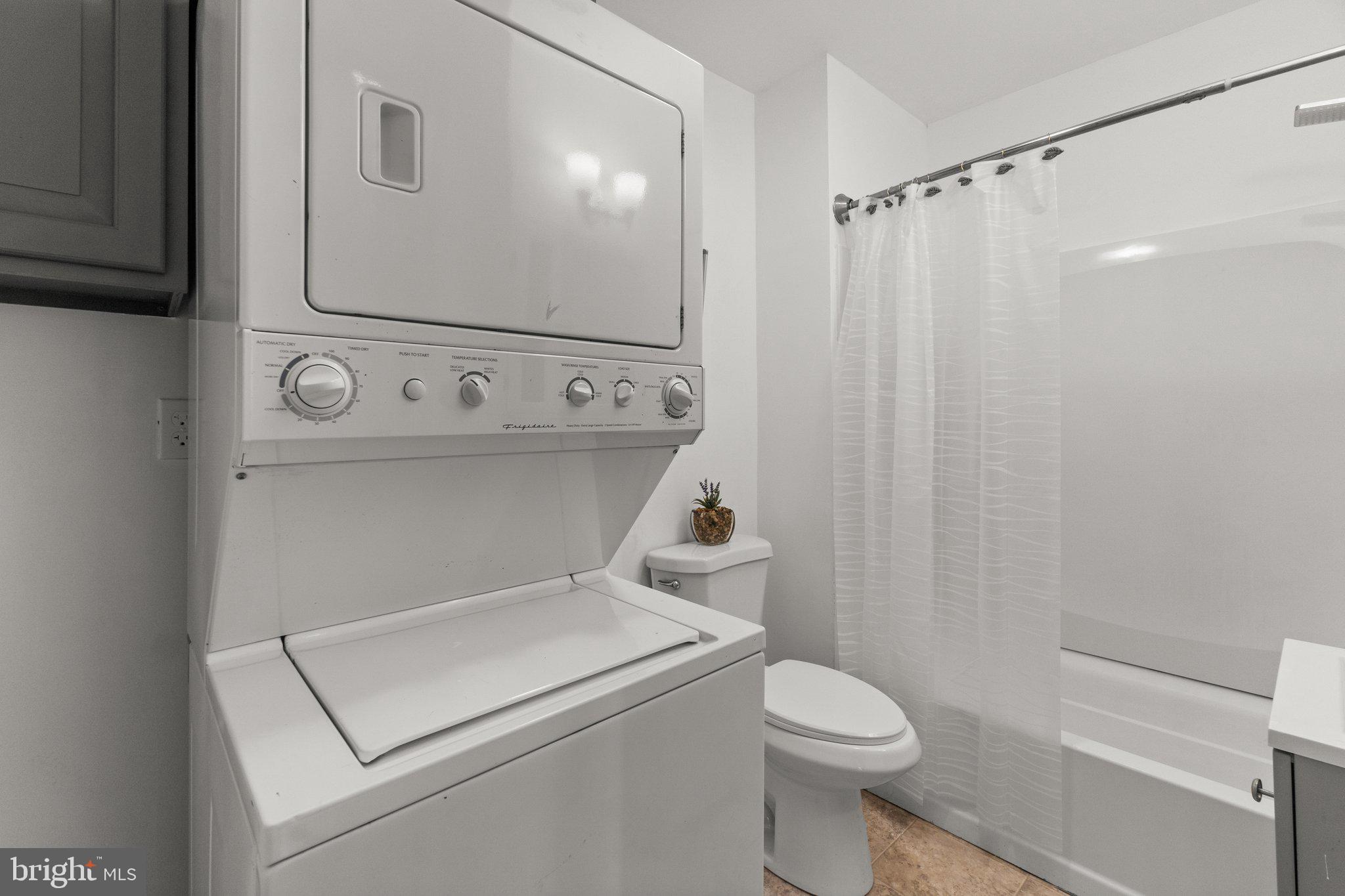 4701 Gross Mill Road Hampstead, MD 21074 - Photo 24 of 62 a utility room with dryer and washer