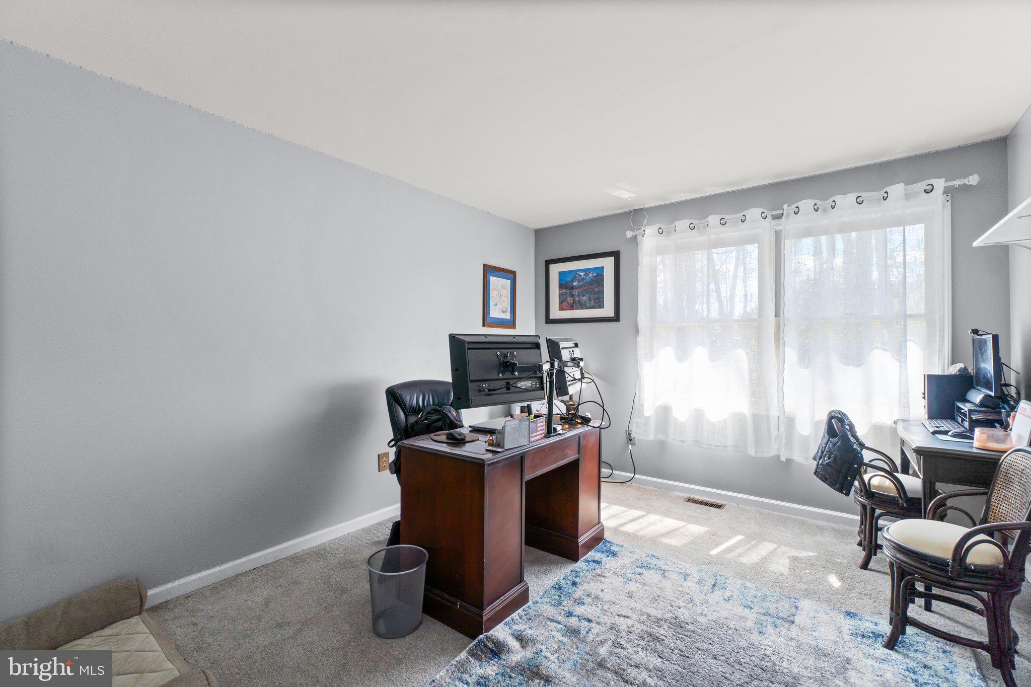 4701 Gross Mill Road Hampstead, MD 21074 - Photo 25 of 62 a view of a workspace with furniture and a window