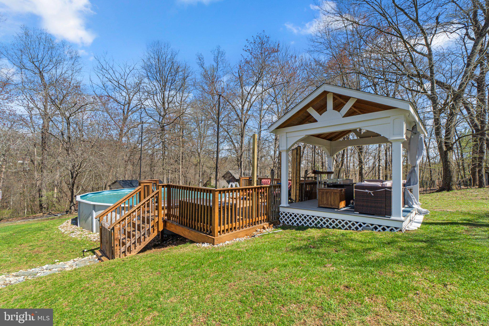 4701 Gross Mill Road Hampstead, MD 21074 - Photo 42 of 62 a view of a house with a yard