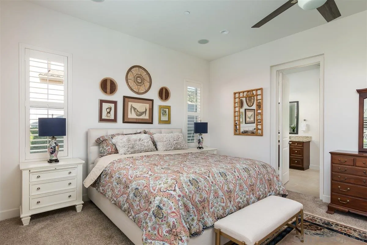 1309 Malone Court Escondido, CA 92026 - Photo 16 of 39 a bedroom with a bed and a dresser