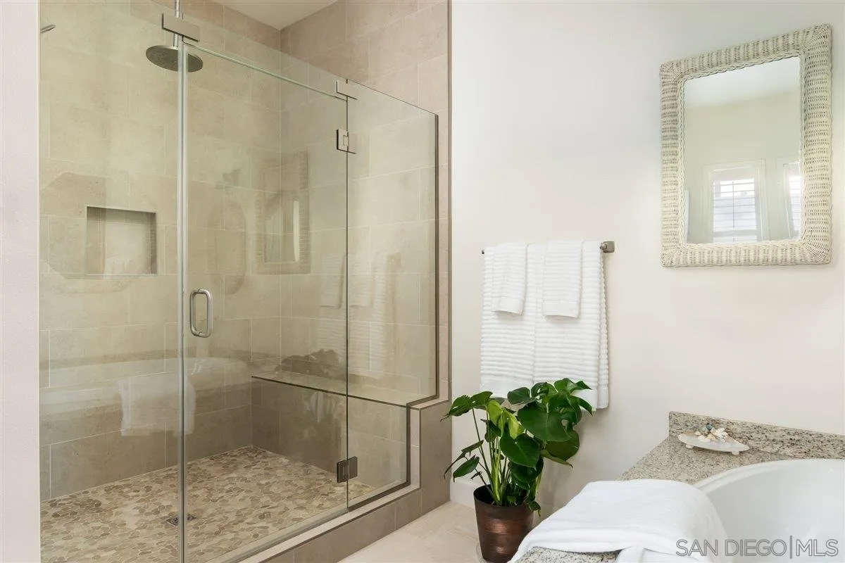 1309 Malone Court Escondido, CA 92026 - Photo 20 of 39 a bathroom with a shower