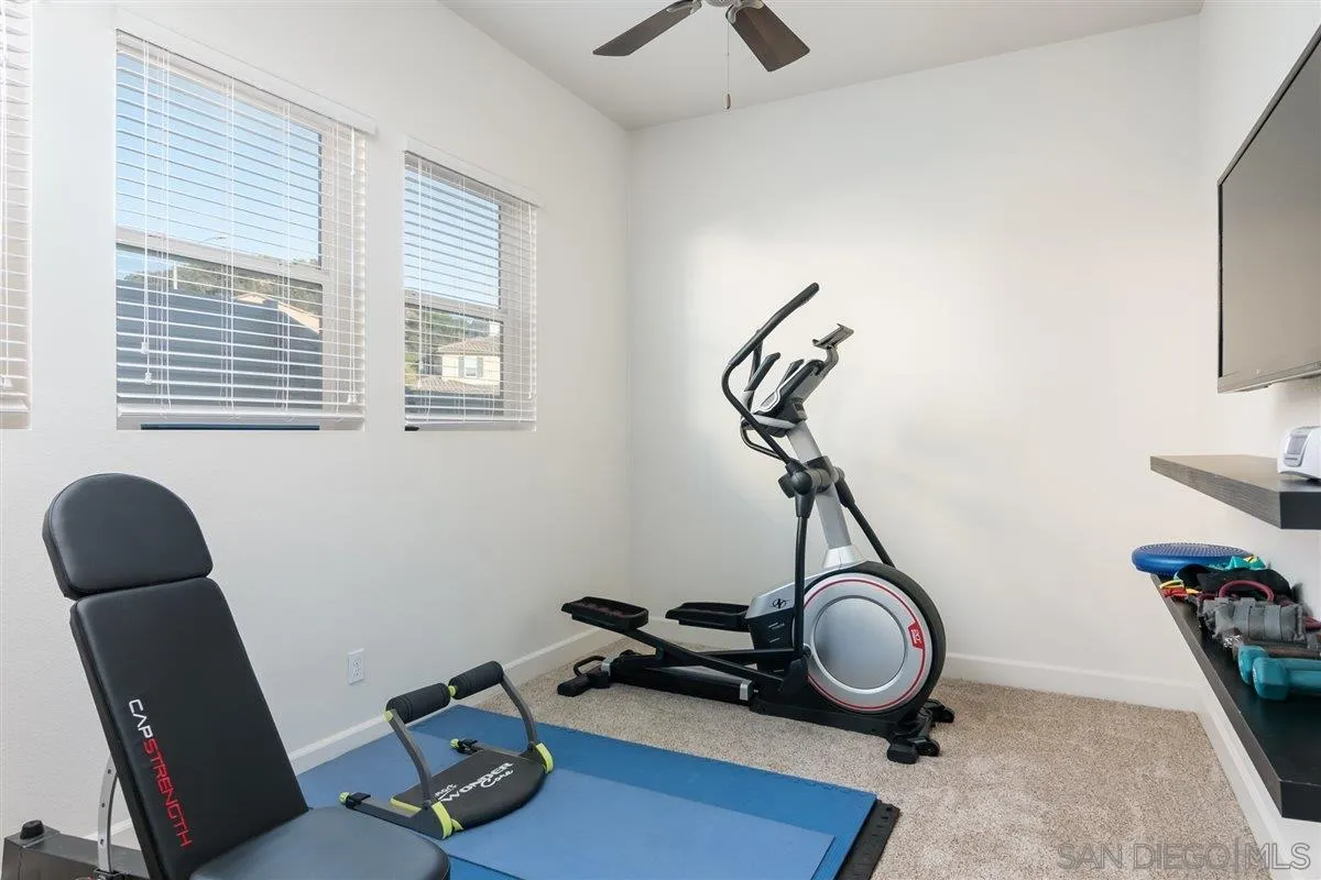 1309 Malone Court Escondido, CA 92026 - Photo 22 of 39 a view of a room with gym equipment