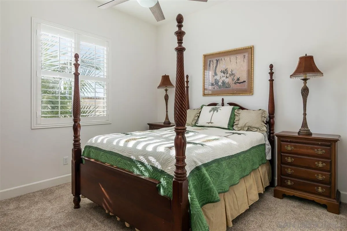 1309 Malone Court Escondido, CA 92026 - Photo 24 of 39 a bedroom with a bed and a window