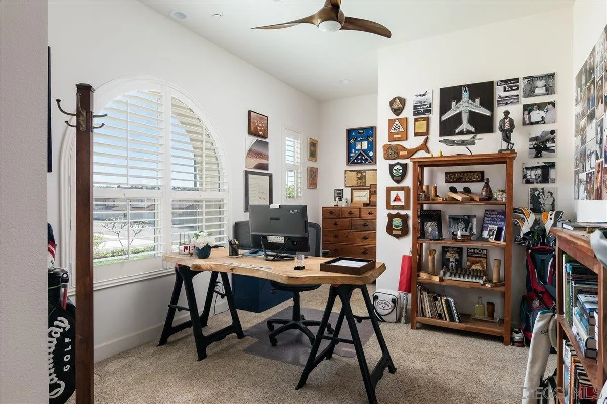 1309 Malone Court Escondido, CA 92026 - Photo 26 of 39 a view of a workspace with furniture and a window