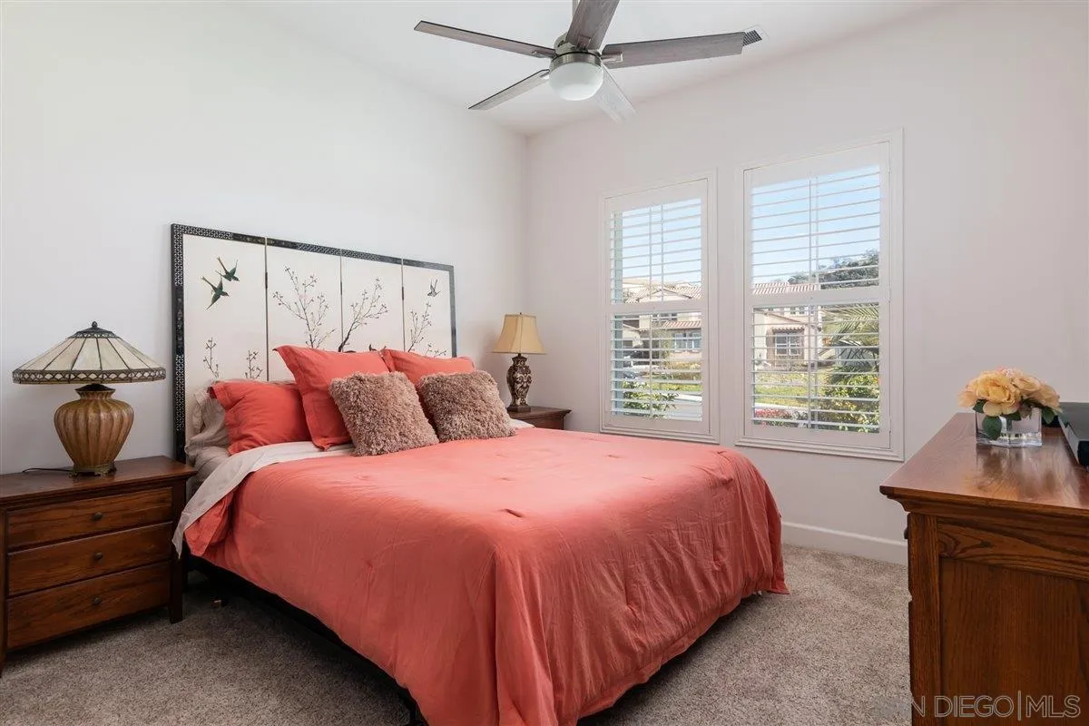 1309 Malone Court Escondido, CA 92026 - Photo 27 of 39 a bedroom with a bed and window
