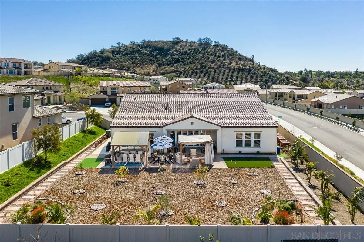 1309 Malone Court Escondido, CA 92026 - Photo 36 of 39 an aerial view of a house with a garden and balcony