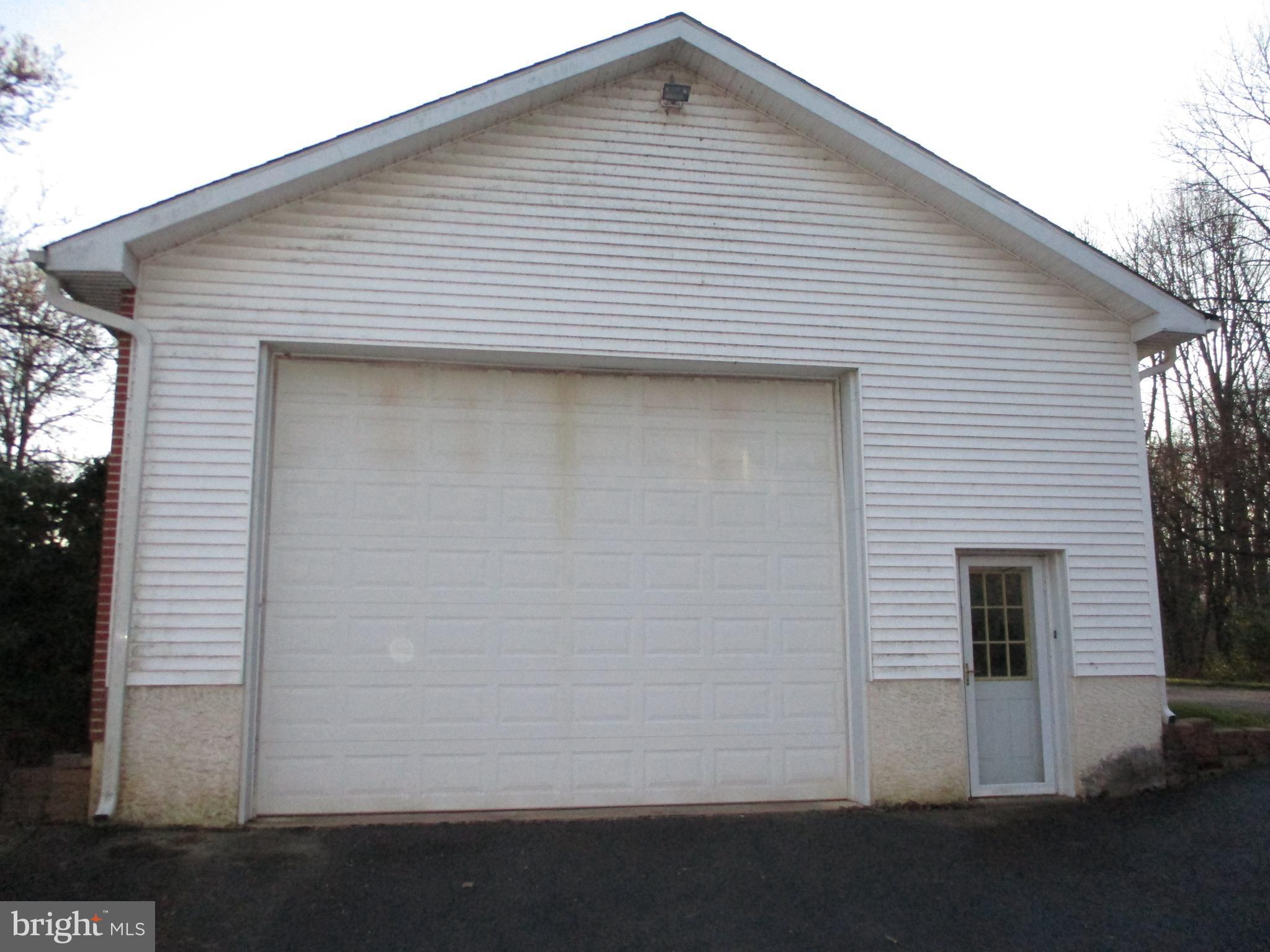 458 Thornton Road Thornton, PA 19373 - Photo 7 of 30 12 Ft high garage door