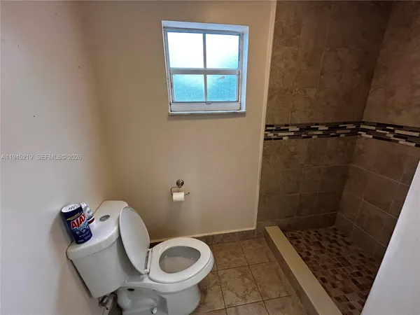 a bathroom with a sink and toilet