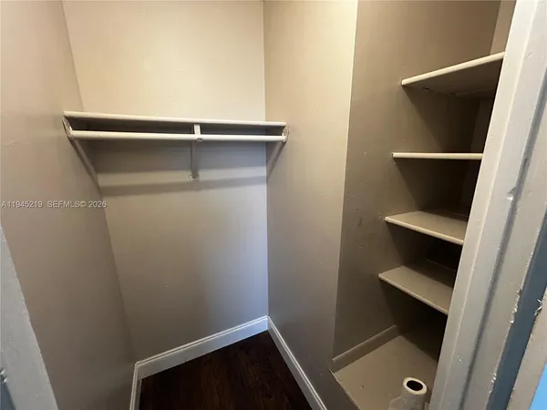 a view of small space with racks on the wall