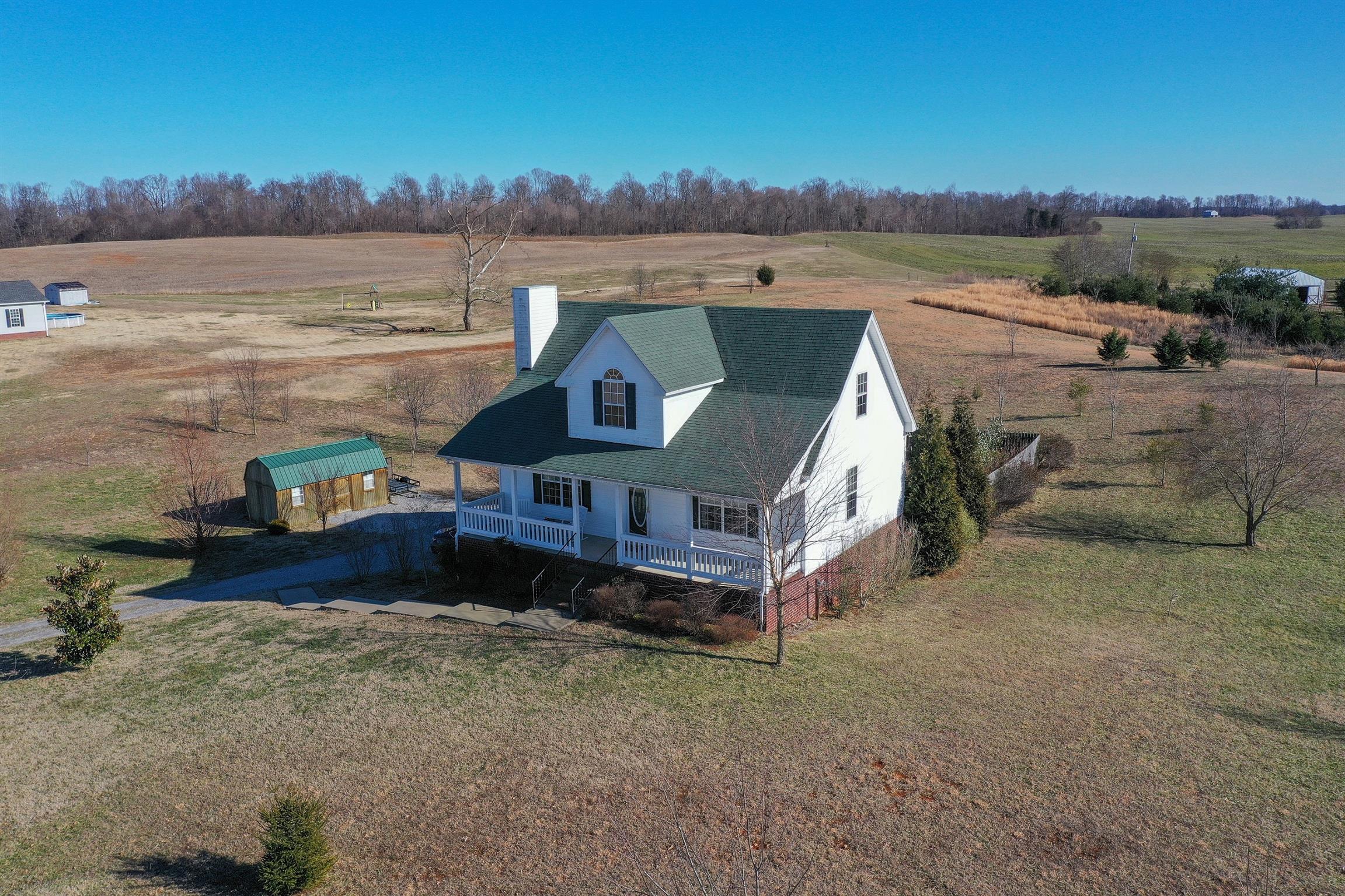 6227 H B Lee Road Springfield, TN 37172 - Photo 2 of 24 a view of a house with a yard and a big yard