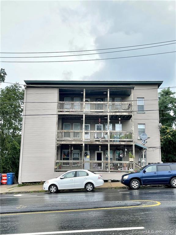 227 Howe Avenue Shelton, CT 06484 - Photo 1 of 8 a car parked in front of a building
