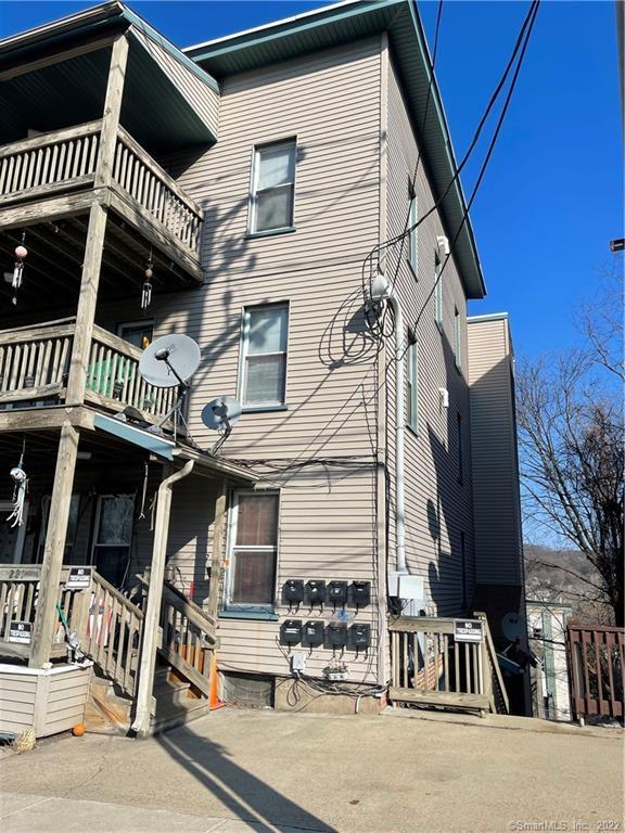 227 Howe Avenue Shelton, CT 06484 - Photo 2 of 8 a view of a house with street