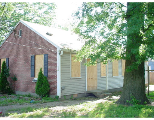 69-71 Ames Street Springfield, MA 01104 - Photo 1 of 1 a view of a house with a yard