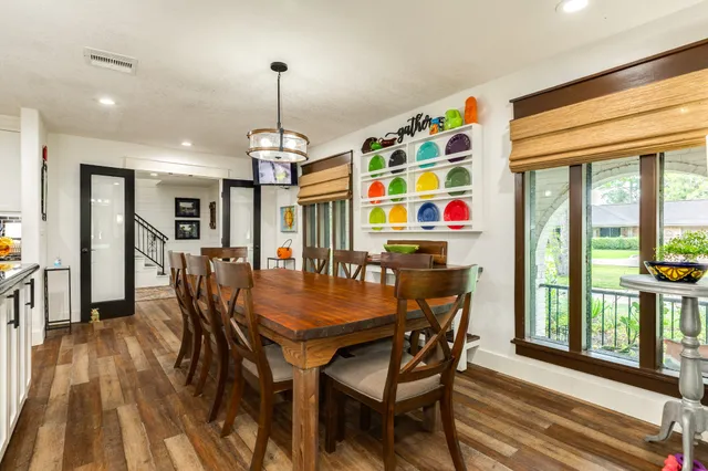 a view of entryway with furniture and wooden floor