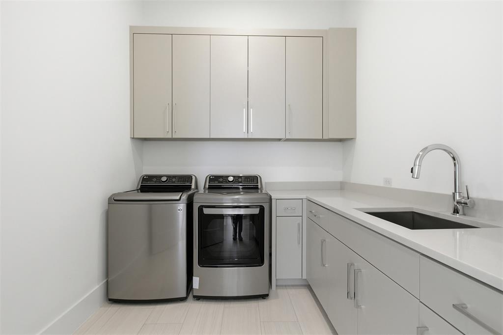9855 Kingsway Avenue Dallas, TX 75230 - Photo 11 of 37 a kitchen with granite countertop white cabinets and white appliances
