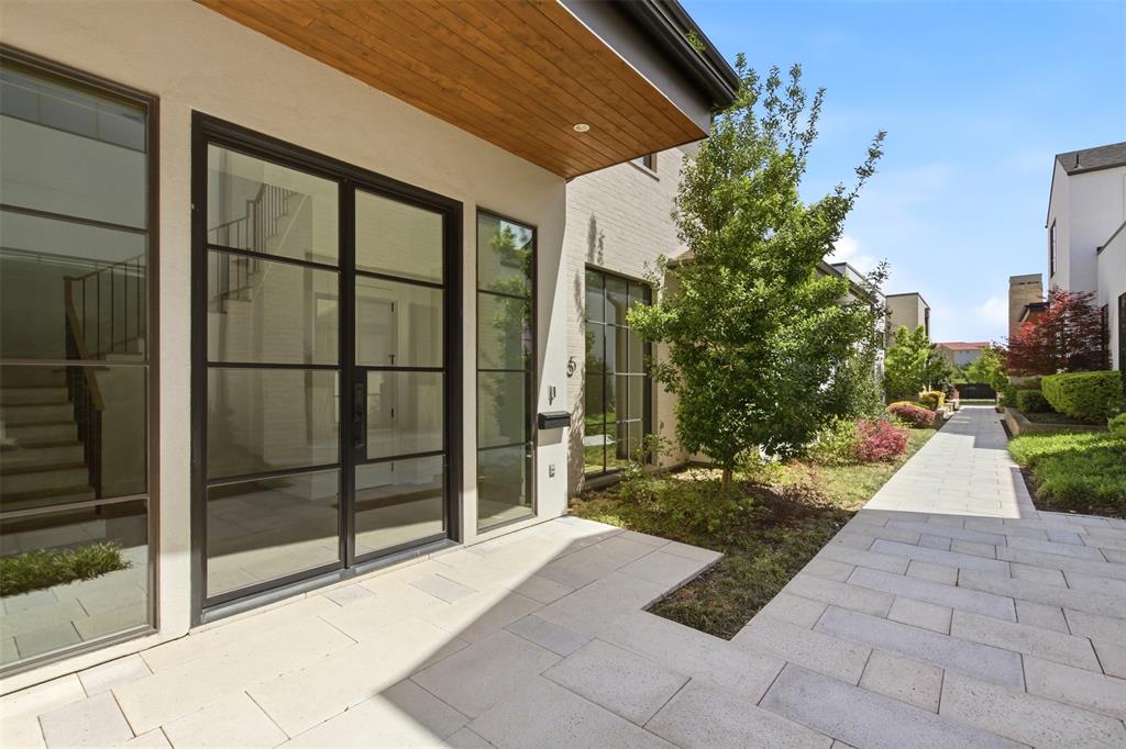 9855 Kingsway Avenue Dallas, TX 75230 - Photo 2 of 37 a view of a entrance gate of a house