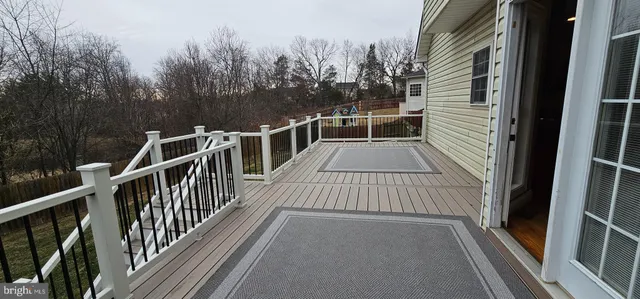 a view of backyard with green space