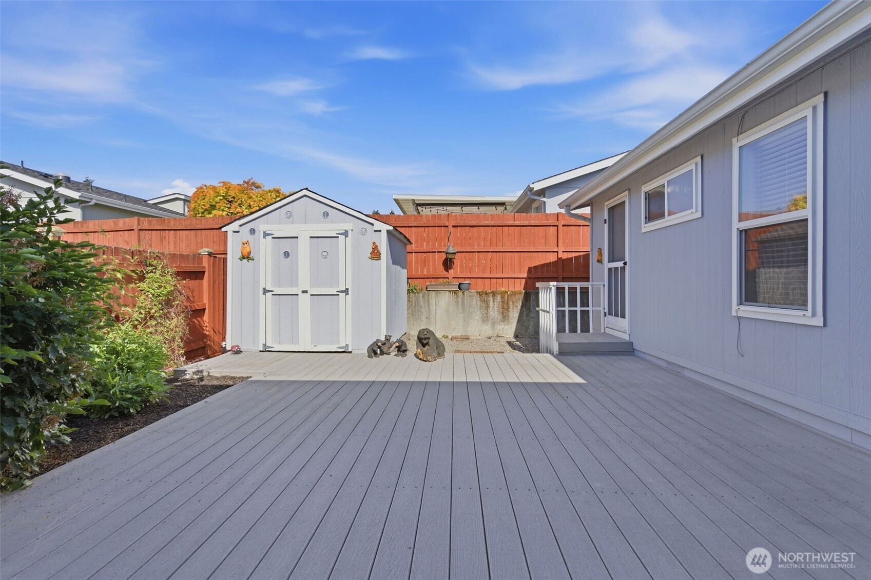 24036 222nd Avenue Southeast Maple Valley, WA 98038 - Photo 27 of 37 an outdoor view of house with wooden floor and fence