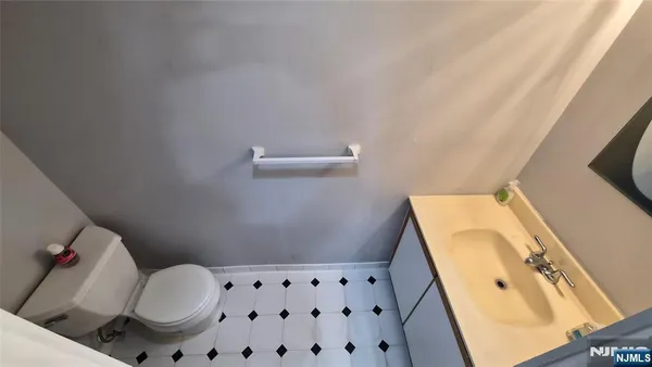 a bathroom with a bathtub and toilet
